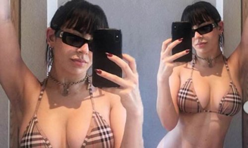 Charli XCX Flaunts Her Eye Popping Assets In A Racy Burberry Bikini As