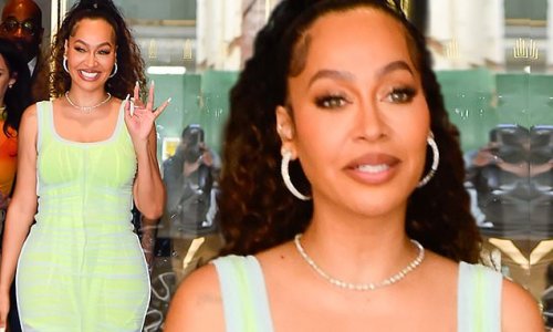 La La Anthony Showcases Her Incredible Figure In Neon Yellow And White