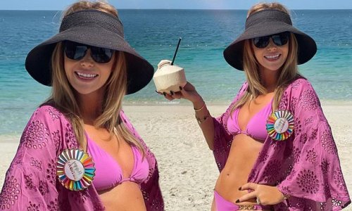 Amanda Holden Shows Off Her Jaw Dropping Figure In A Tiny Pink Bikini