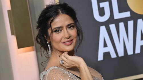 Salma Hayek Wore A Dress Cut So Low It Revealed Her Black Lace Bra On