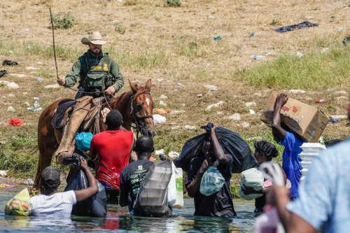Uproar over mounted border agents turning back Haitian migrants