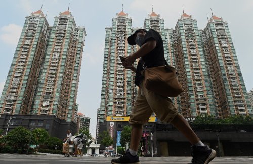 Asian, European stocks bounce from rout but Evergrande fears linger