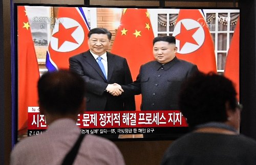 Leaders of China and North Korea vow to strengthen ties : KCNA