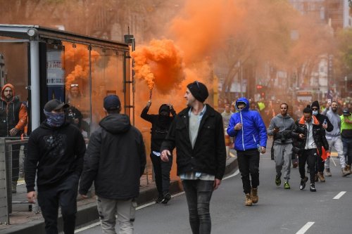 Melbourne police fire to disperse violent anti-vaccine protest