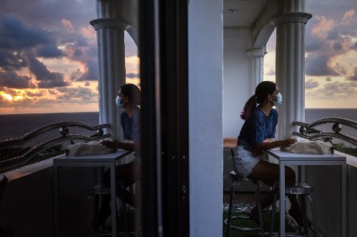 Digital nomads flee virus-hit Manila for shattered tourist towns