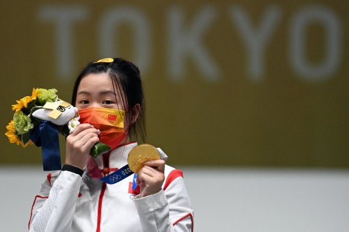 Chinese shooter wins first gold of Tokyo Olympics as storm threat looms