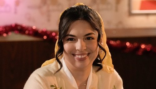 Isabella Gomez Slips Into ‘The Goldbergs,’ Flaunts Curves in White Clingy Dress