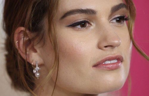 Lily James Stuns In Plunging White Lace Lingerie, “meow” 