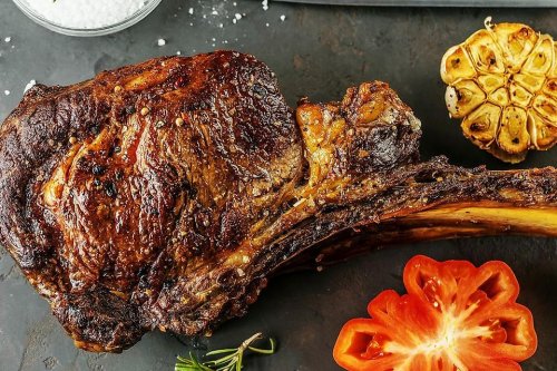 Steakhouse Tomahawk Steak Recipe With Roasted Garlic Butter & Herbs Can't Be Beat