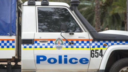 Woman beaten by three men who smashed into Alice Springs home using axe