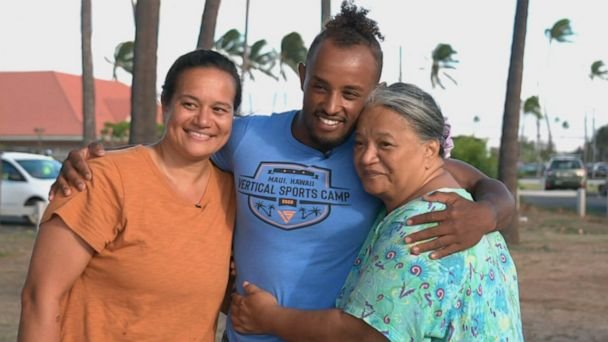 Woman reunites with stranger who carried her on his back to evacuate Maui wildfires