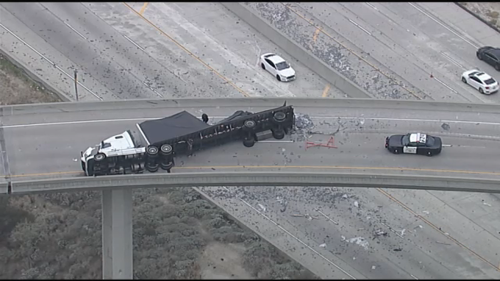 5 Freeway accident: Crash causes big rig to flip over near Newhall Pass