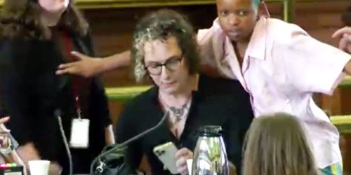 Activist Protects Transgender Witness From Texas Senate Officials
