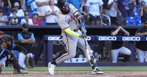 In one swing, Marcell Ozuna stuns Marlins and creates perhaps the moment of the season for Braves