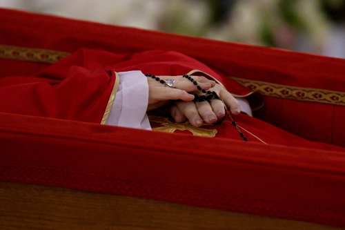 Vatican video shows Pope in open casket