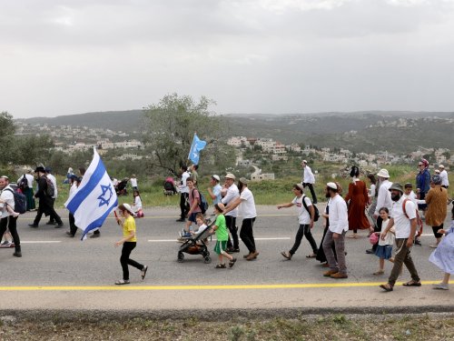 Who are Israeli settlers, and why do they live on Palestinian lands?