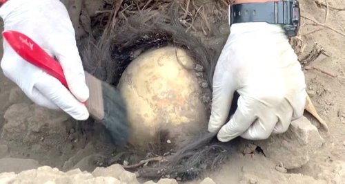 Archaeologists In Peru Unearth 1,000-Year-Old Child Mummies — And They Still Have Hair On Their Heads