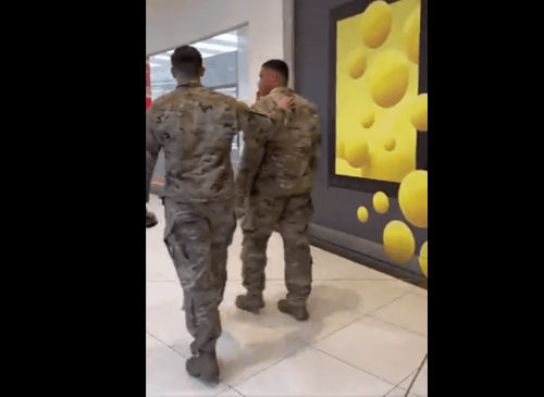 Video: Man hurls racist insults at soldiers while chasing them around mall