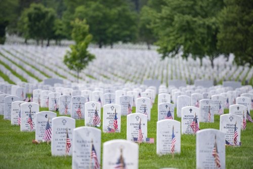 ‘Flags-In’ ceremony honors individuals at Arlington National Cemetery ...