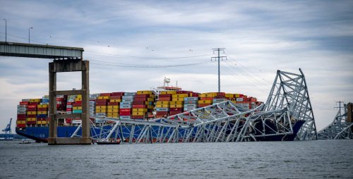 Crews begin removing shipping containers off the Dali, ship that collapsed Key Bridge