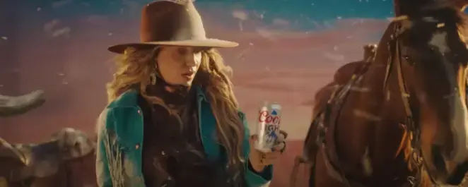 Watch Lainey Wilson Catch a Silver Bullet from the Chill Train in Her Coors Light Super Bowl Commerical