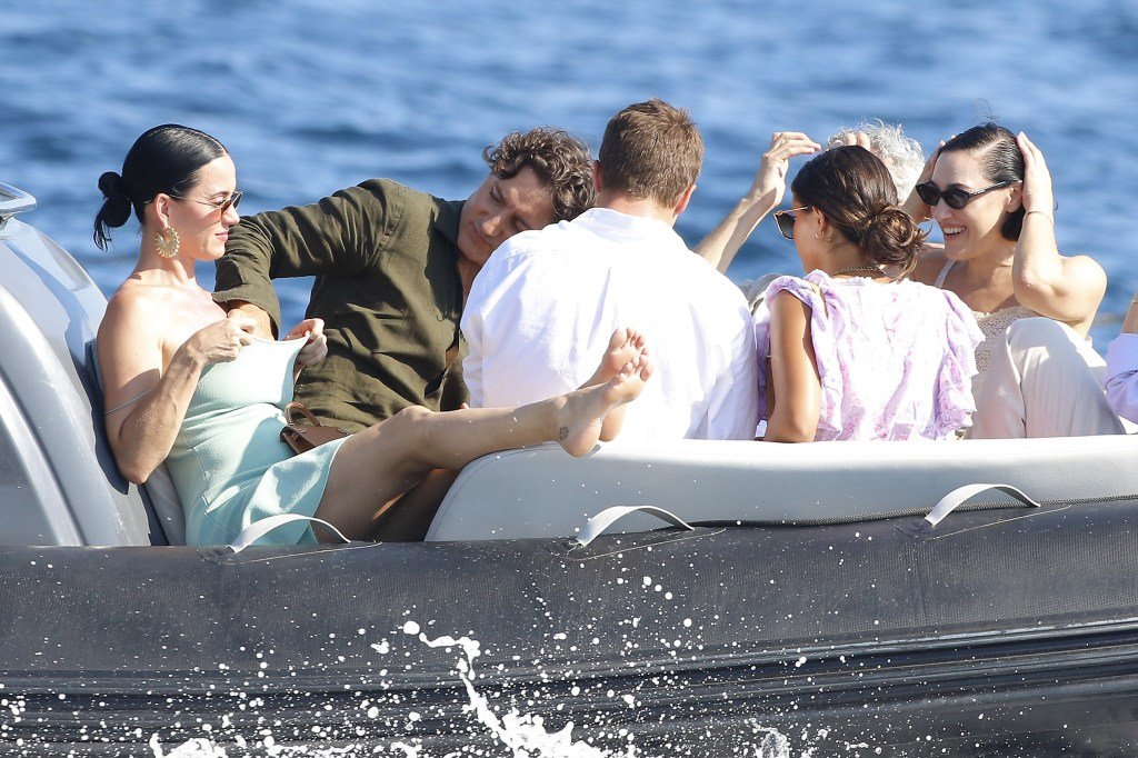 Justin Trudeau applies sunscreen down girlfriend Katy Perry’s top in steamy South of France boat ride