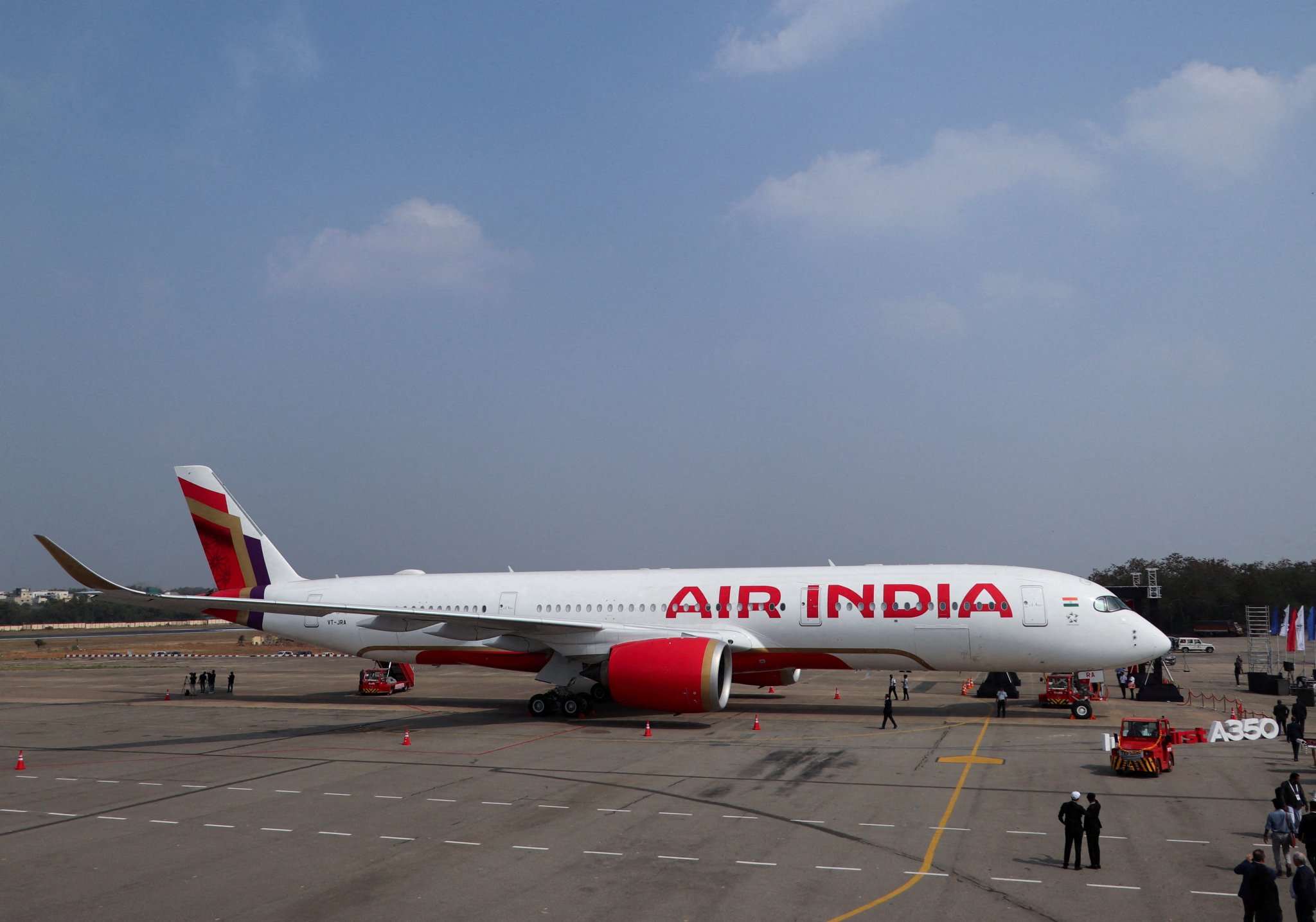 A passenger jet's sudden midair drop leaves 17 hospitalized