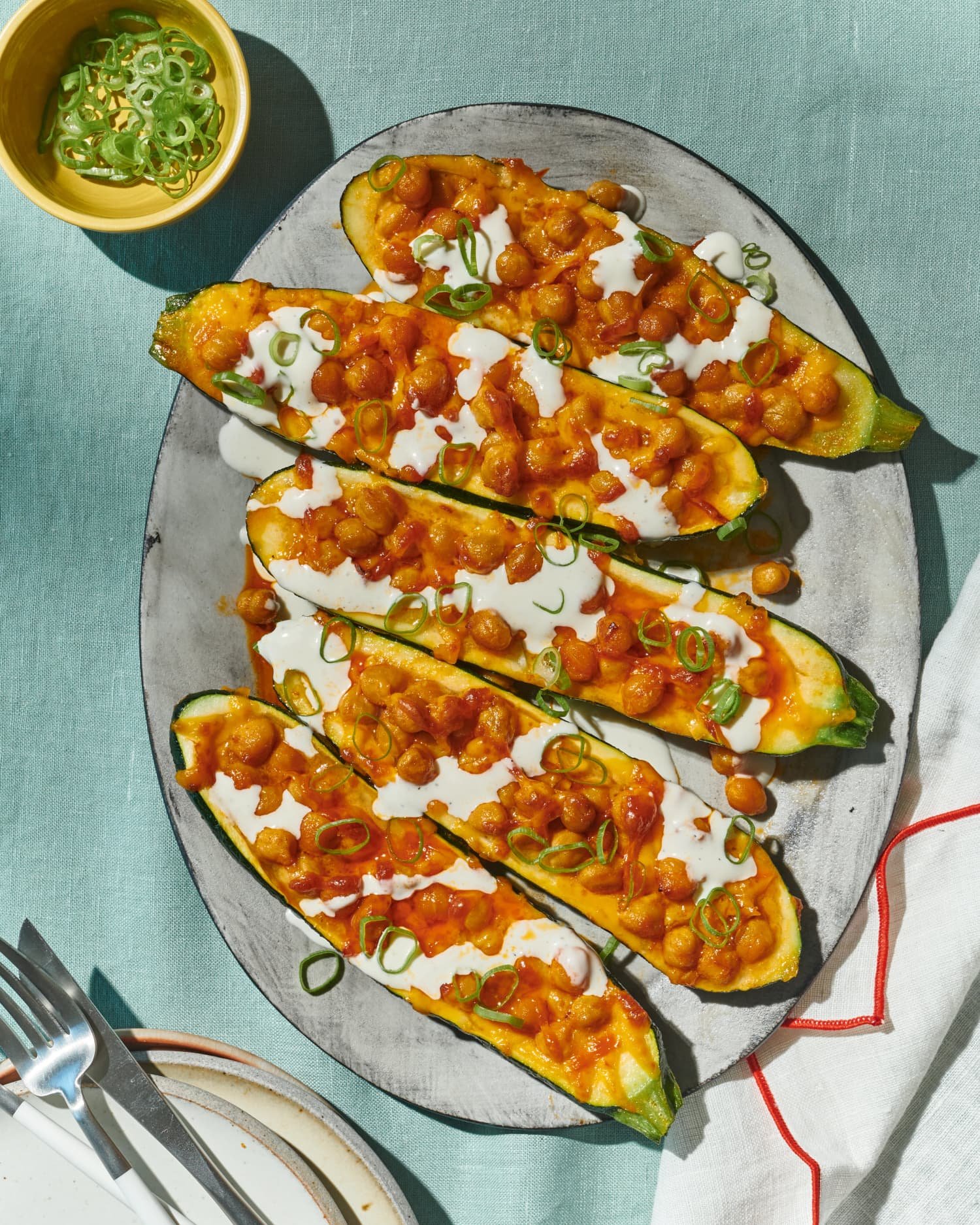 Spice Up Your Summer with Buffalo Chickpea Zucchini Boats