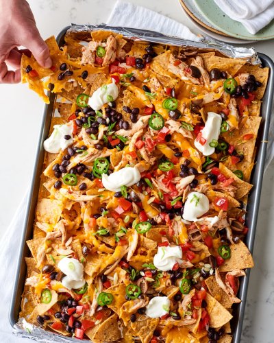 These Easy Sheet Pan Chicken Nachos Will Make You a Dinner Hero