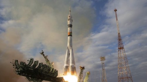 Russian Soyuz spacecraft with 3 astronauts docks at the International Space Station