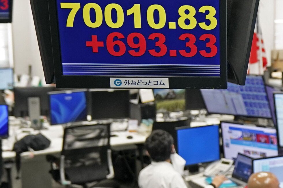 Asian shares are mostly higher and Japan's Nikkei tops 70,000 before BOJ rate hike