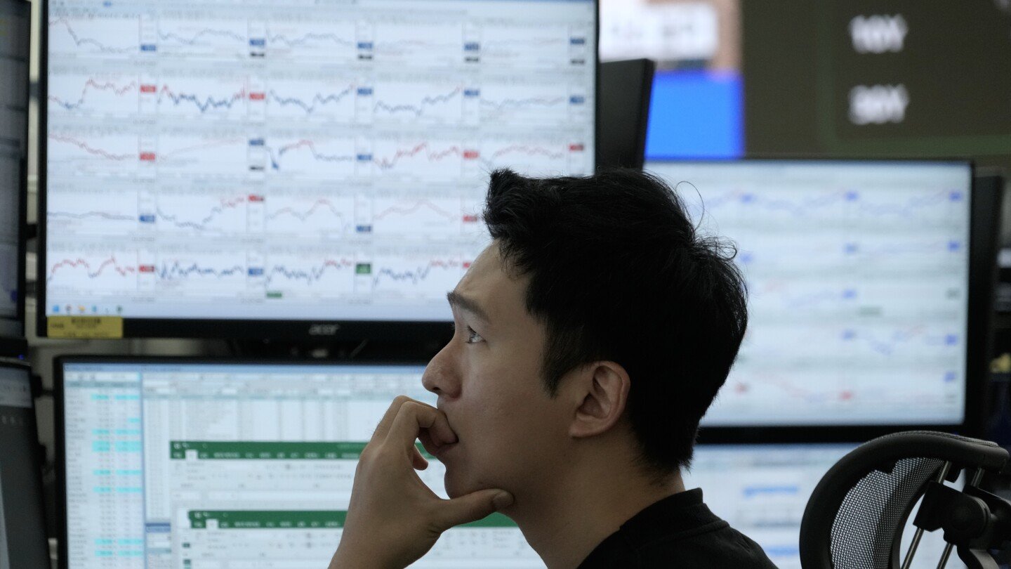 Asian shares sink, tracking a tech-led sell-off on Wall Street