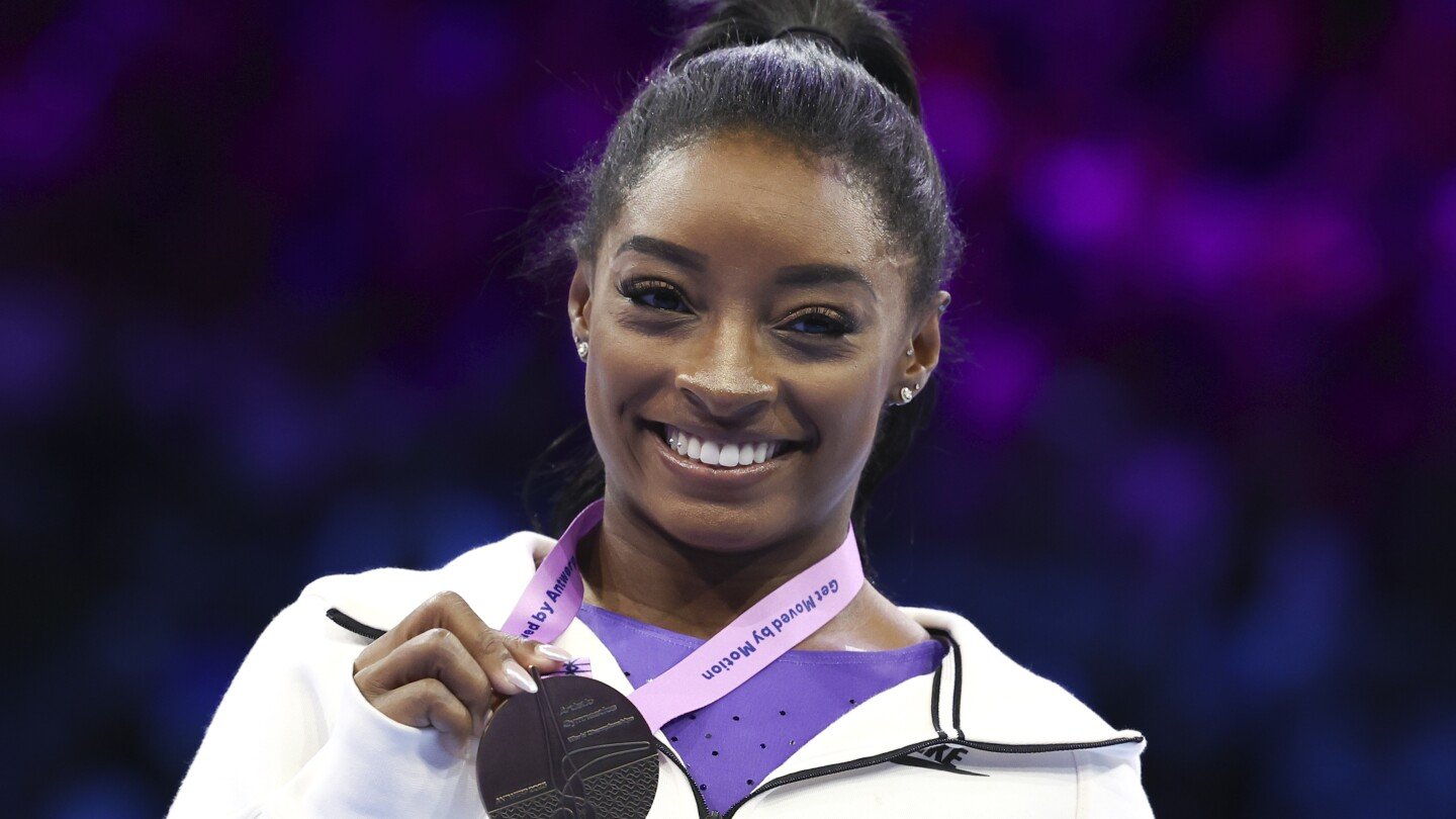 Unstoppable Simone Biles wraps up world championships comeback with 2 more gold medals