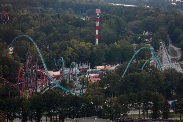 Image from AP's coverage: Georgia amusement park reopens as scheduled after roller coaster death