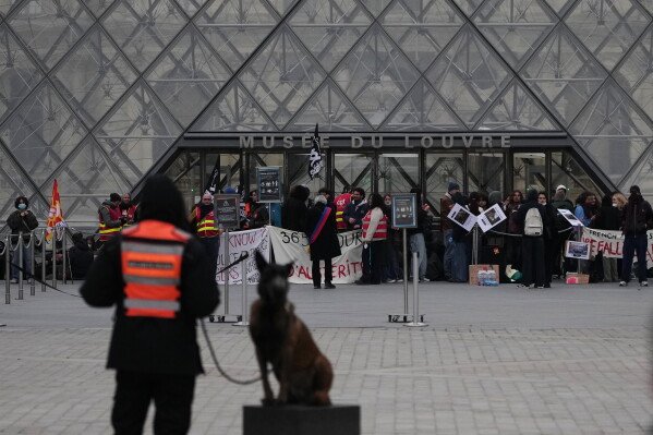 Image from AP's coverage: French authorities deploy 70,000 officers for Saturday protests; Louvre and other museums closed