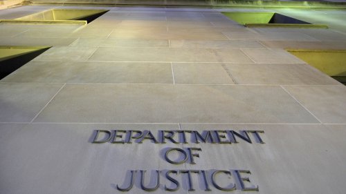 Justice Department sharply criticizes judge who blocked enforcement of an order targeting a law firm
