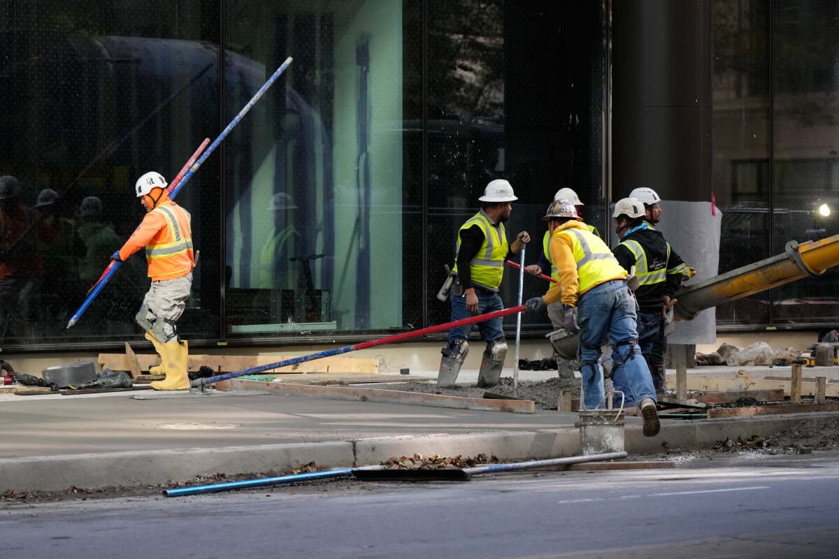 Image from AP's coverage: US jobless claims fell to 194,000 last week, lowest since July