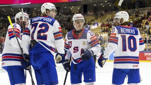 US scores 5 goals in middle period to rout Kazakhstan and advance at ice hockey worlds