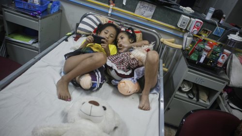 AP PHOTOS: 2 girls survived Nepal's 2015 earthquake. Each lost a leg but found a friendship