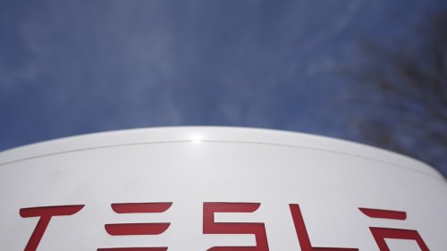 Man drives car into protesters outside a Tesla dealership, nobody hurt, sheriff says