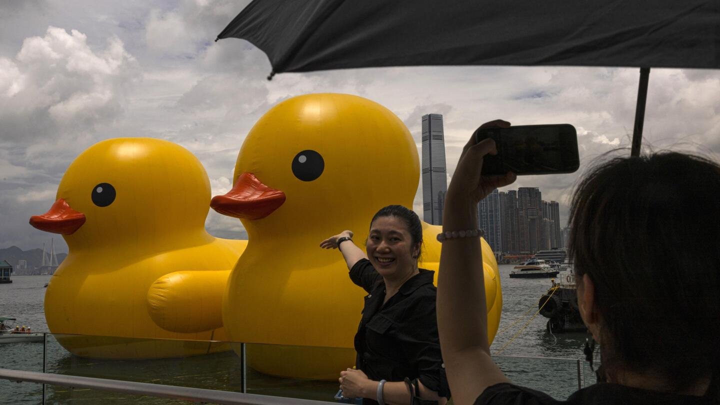 Giant inflatable ducks make a splash in Hong Kong as pop-art project returns after 10 years