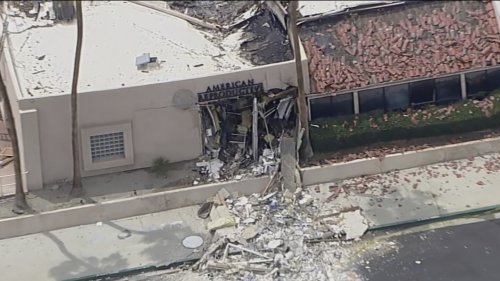 Police and firefighters respond to a car explosion rocking the California city of Palm Springs