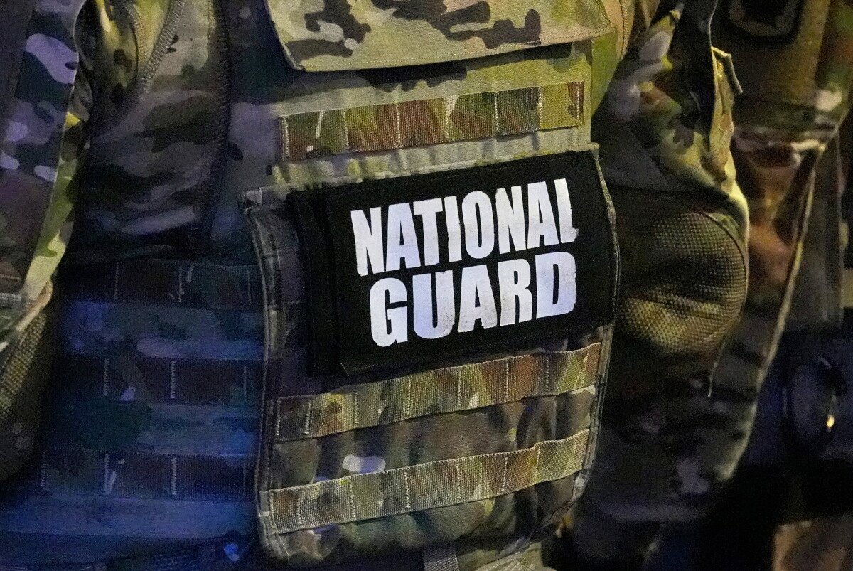 Image from AP's coverage: National Guard member is shot while breaking up a fight in Washington, suspect is hit in return fire