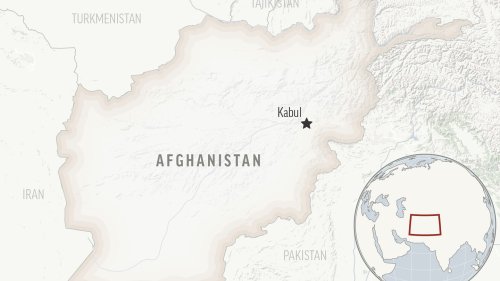 Taliban hold public execution for 2 men, who are killed by gunfire in a stadium as thousands watch