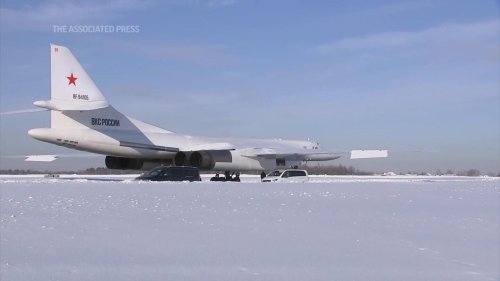 Putin shows muscle with Russia's new military bomber