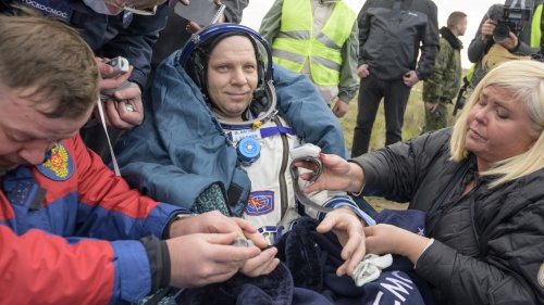 A Soyuz capsule with 2 Russians and 1 American returns to Earth from the International Space Station