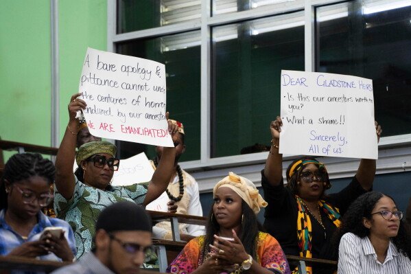 Image from AP's coverage: Caribbean seeks reparations and questions role of monarchy before King Charles III visits