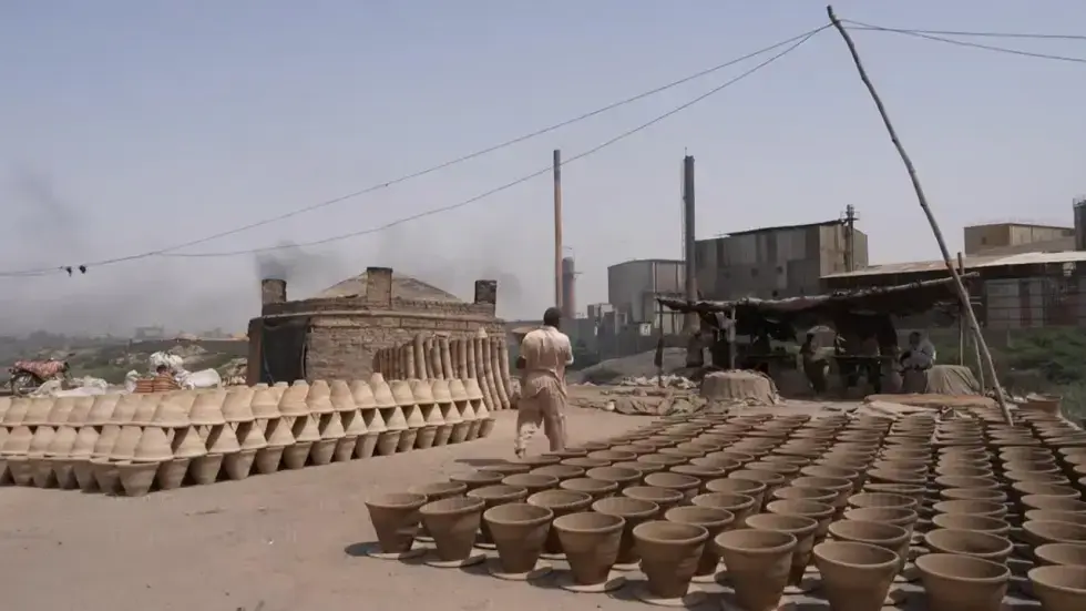 Image from AP's coverage: Pakistan's factory workers swelter in extreme heat as global brands fail on safety pledges