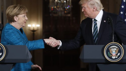 German ex-leader Merkel says she felt sorrow at Trump's comeback and recalls awkward non-handshake