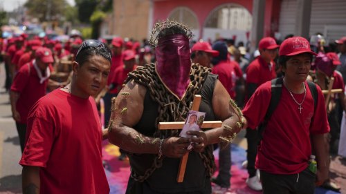Men toting chains and pierced with cactus keep a Good Friday tradition in Atlixco, Mexico